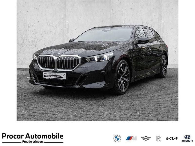 Schwarz Gebraucht 2024 BMW 520 Performance Kombi | 48.790 € (Superpreis) - Bild 1/4