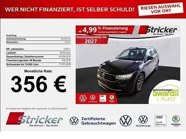 Schwarz (deep black perleffekt) Gebraucht 2022 VW Tiguan Life SUV | 29.950 € (Fairer Preis) - Bild 1/4