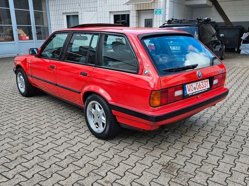 Gebraucht BMW 318 113 PS (83 kW) 1991 Rot Kombi