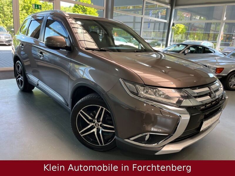 Granitbraun Gebraucht 2016 Mitsubishi Outlander SUV | 15.990 € (Fairer Preis) - Bild 1/4
