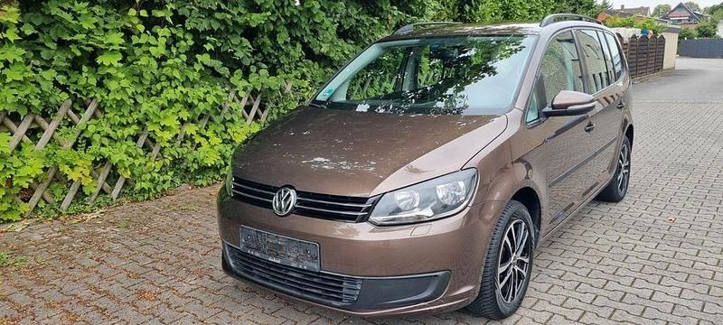 Braun Gebraucht 2011 VW Touran Van / Kleinbus | 6.900 € (Fairer Preis) - Bild 1/4