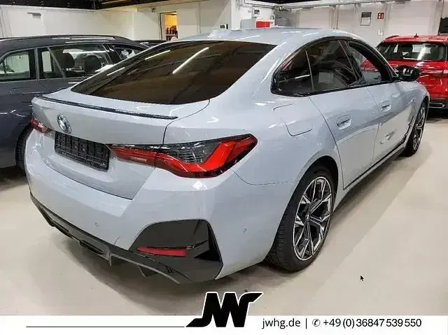Gebraucht BMW i4 M Sport 400 kW (544 PS) 2023 Brooklyn grau metallic Limousine
