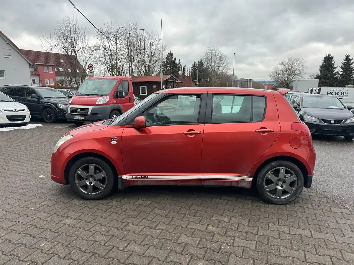 Usado Suzuki Swift 70 CV (51 kW) 2007 Naranja Utilitario