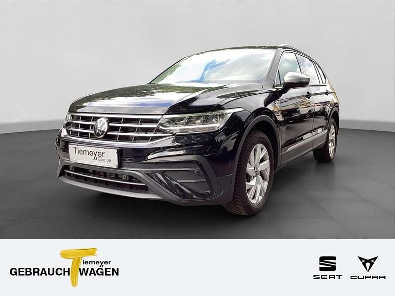 Schwarz Gebraucht 2024 VW Tiguan Allspace Life SUV | 32.840 € (Superpreis) - Bild 1/4