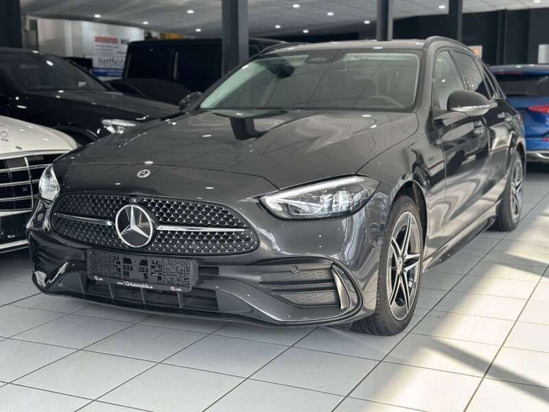 831 graphite grey Gebraucht 2023 Mercedes C300e AMG Kombi | 40.400 € (Superpreis) - Bild 1/4