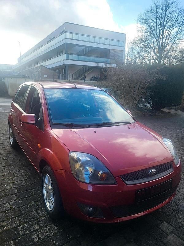 Gebraucht Ford Fiesta Style 101 PS (74 kW) 2007 Orange Kleinwagen