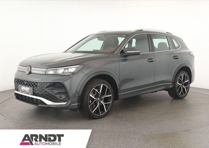 Grau Gebraucht 2024 VW Tiguan R-line SUV | 47.684 € - Bild 1/4
