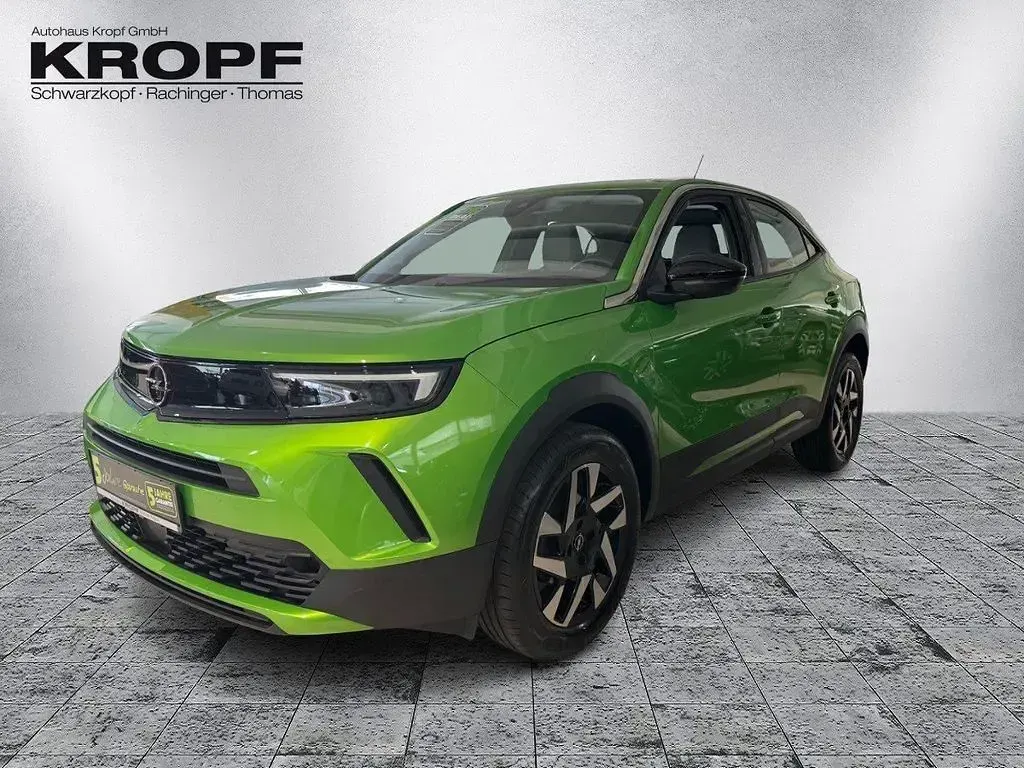 Gebraucht Opel Mokka Elegance 101 PS (74 kW) 2024 Lackierung matcha green/typ au SUV