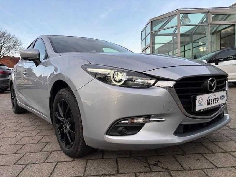 Diamantsilber metallic Gebraucht 2018 Mazda 3 Exclusive-Line Limousine | 14.750 € (Etwas zu teuer) - Bild 1/4