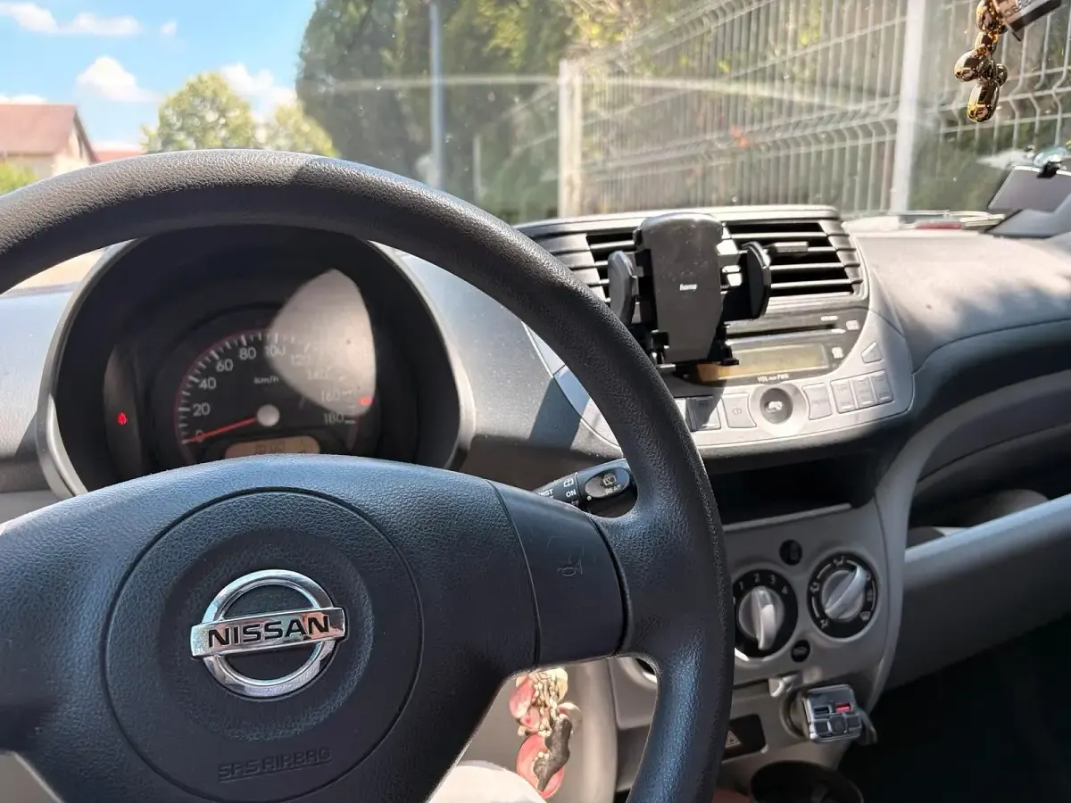 Gebraucht Nissan Pixo 68 PS (50 kW) 2010 Schwarz Kleinwagen
