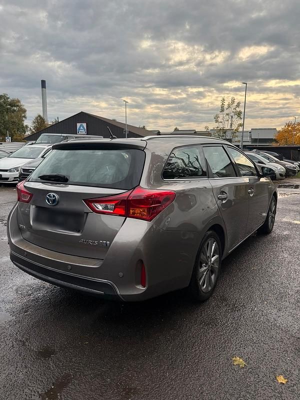 Gebraucht Toyota Auris Hybrid 136 PS (100 kW) 2014 Silber Kombi