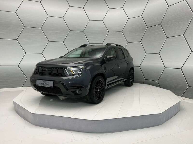Kometengrau Neu 2025 Dacia Duster Journey SUV | 33.990 € - Bild 1/4