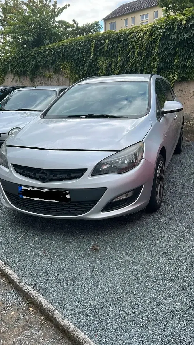 Gebraucht Opel Astra 110 PS (80 kW) 2015 Silber Kleinwagen