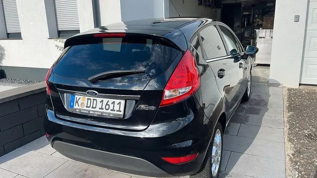 Gebraucht Ford Fiesta Titanium 95 PS (69 kW) 2012 Schwarz Limousine