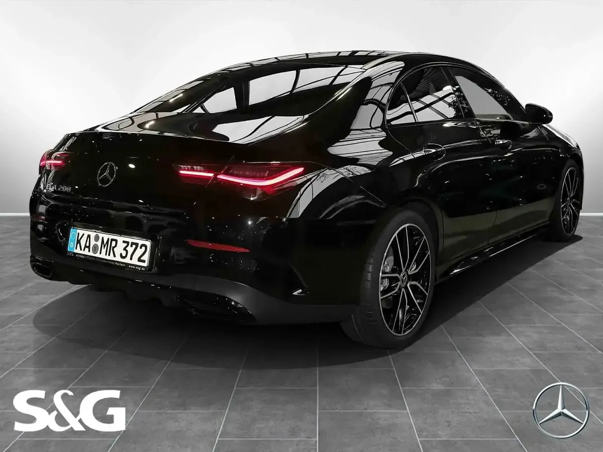 Gebraucht Mercedes CLA200 AMG 163 PS (119 kW) 2025 Metalliclack kosmosschwarz Coupé