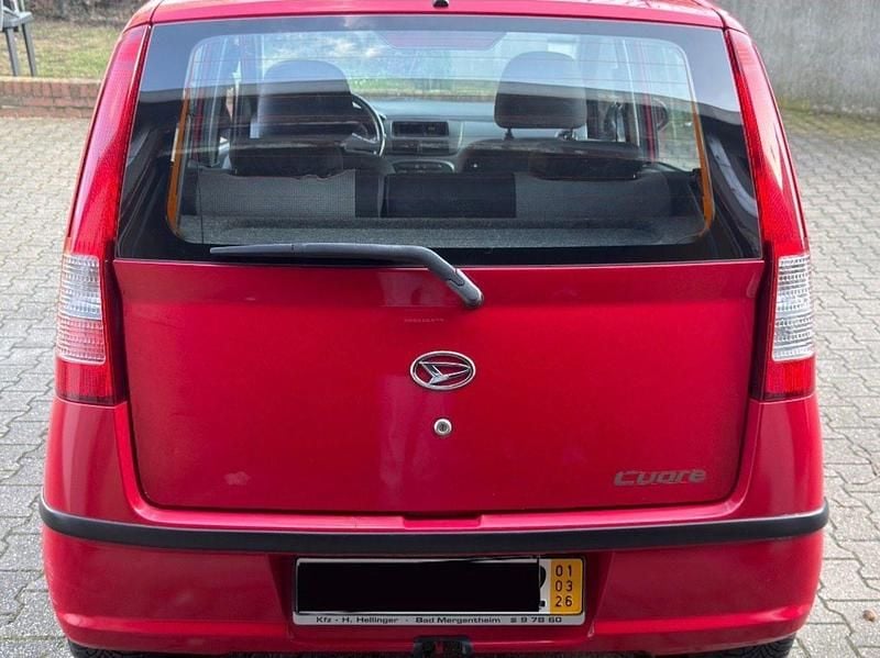 Gebraucht Daihatsu Cuore 58 PS (42 kW) 2003 Rot Kleinwagen
