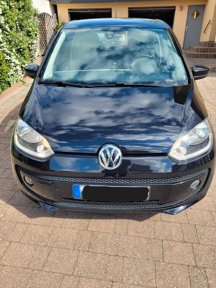 Usado VW up! 75 CV (55 kW) 2012 Negro Utilitario
