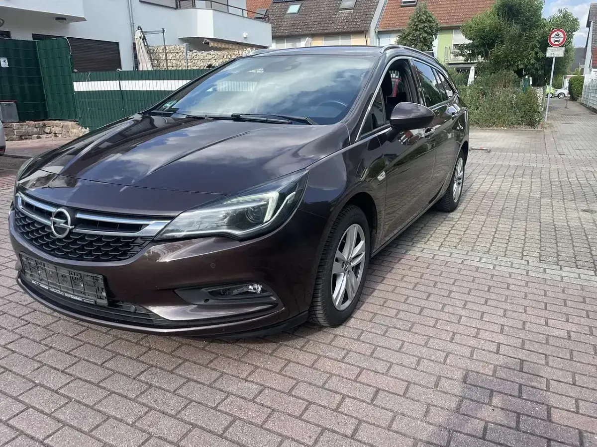 Gebraucht Opel Astra Dynamic 136 PS (100 kW) 2017 Kokosnuss braun (m2) Kombi