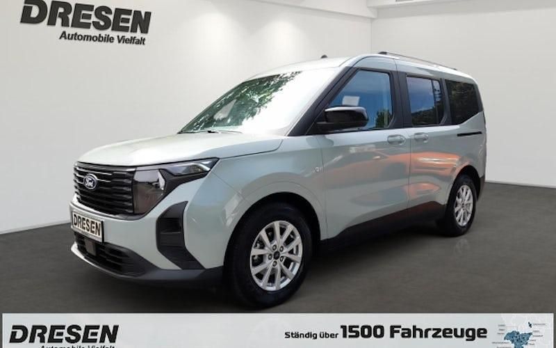 Grau Gebraucht 2024 Ford Tourneo Courier Titanium Van / Kleinbus | 24.880 € - Bild 1/4