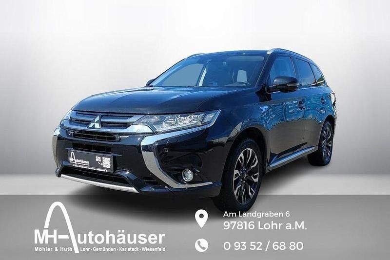 Schwarz Gebraucht 2017 Mitsubishi Outlander P-HEV Top SUV | 18.990 € (Fairer Preis) - Bild 1/4