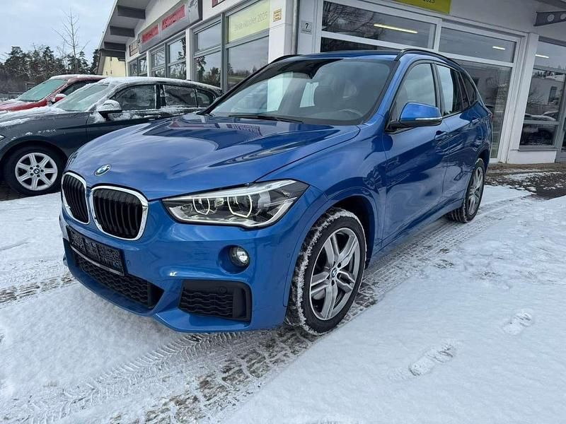 Estorilblau 2 metallic Gebraucht 2017 BMW X1 M Sport SUV | 17.300 € (Guter Preis) - Bild 1/4