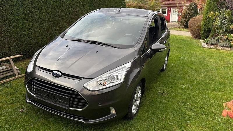 Grau Gebraucht 2017 Ford B-MAX Titanium Van / Kleinbus | 9.800 € (Fairer Preis) - Bild 1/4