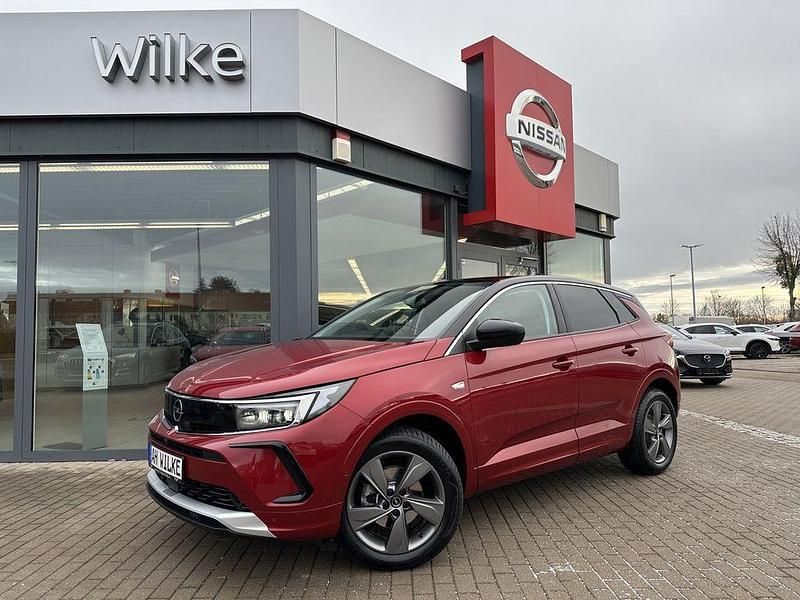 Lackierung bright red/metallic Gebraucht 2023 Opel Grandland X Elegance SUV | 22.490 € (Fairer Preis) - Bild 1/4