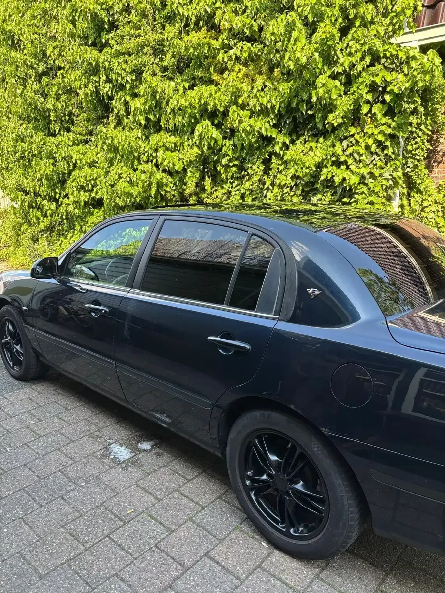 Gebraucht Kia Opirus 204 PS (150 kW) 2005 Blau Limousine