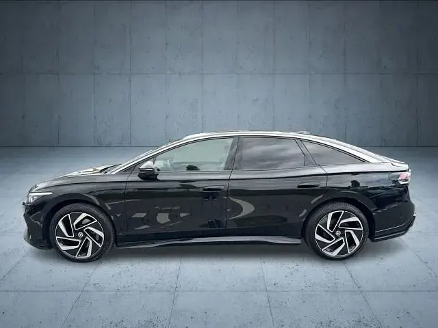 Gebraucht VW ID.7 Pro 210 kW (286 PS) 2023 Grenadillschwarz metallic Kleinwagen