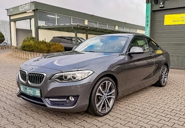 Grau Gebraucht 2014 BMW 228 Sport Line Coupé | 16.470 € (Superpreis) - Bild 1/4