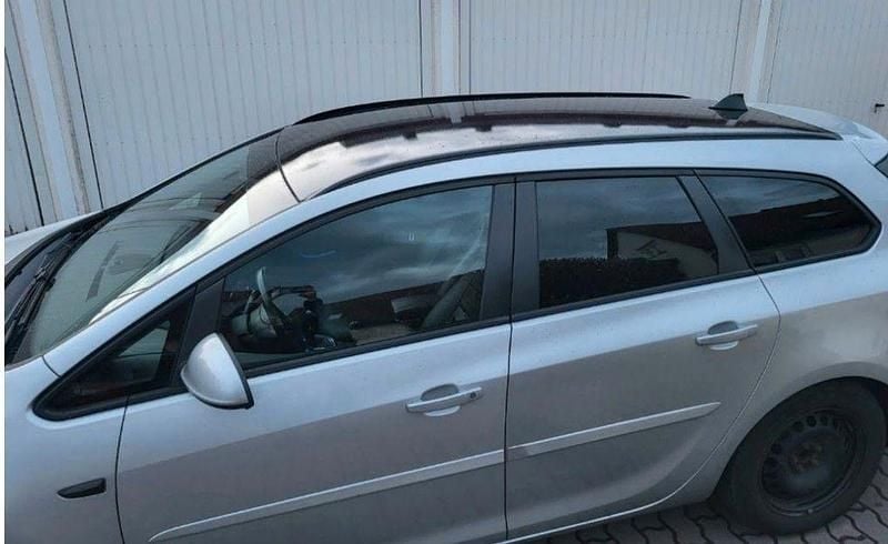 Gebraucht Opel Astra 95 PS (69 kW) 2011 Silber Kombi