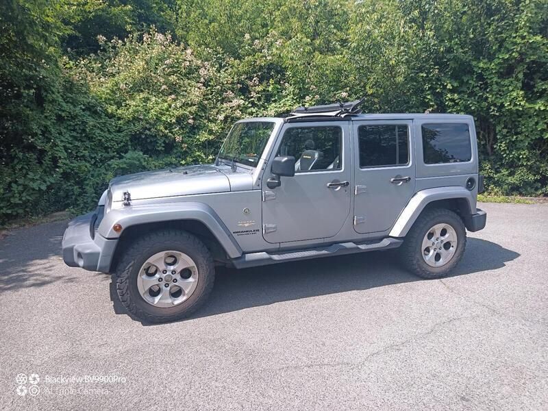 Grau Gebraucht 2014 Jeep Wrangler Sahara SUV | 23.900 € (Superpreis) - Bild 1/4