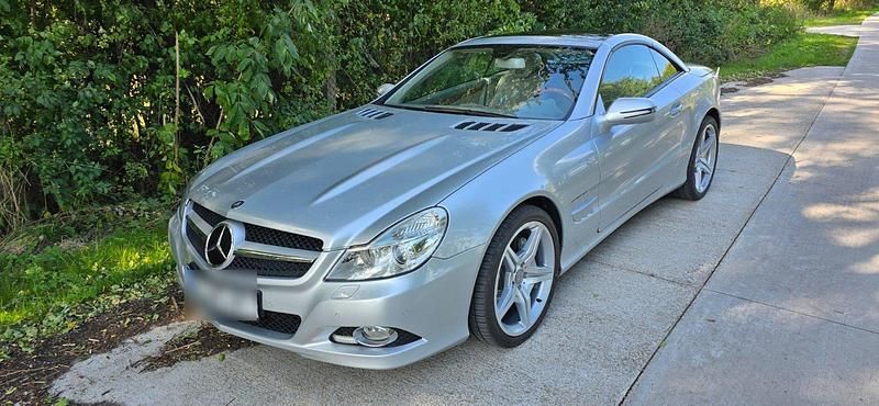 Silber Gebraucht 2009 Mercedes SL500 Cabrio | 29.999 € (Fairer Preis) - Bild 1/4