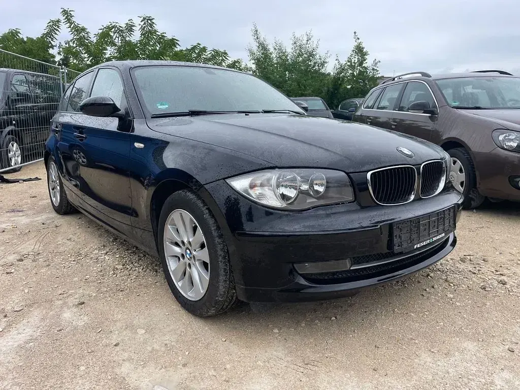 Używany BMW 116 122 KM (89 kW) 2009 Czarny Hatchback