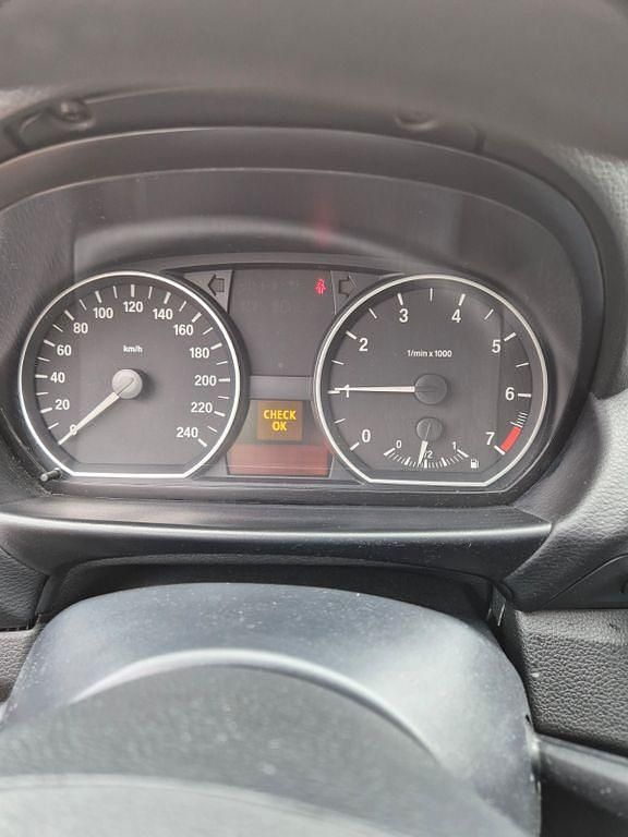 Second-hand BMW 116 122 CP (89 kW) 2009 Negru Hatchback