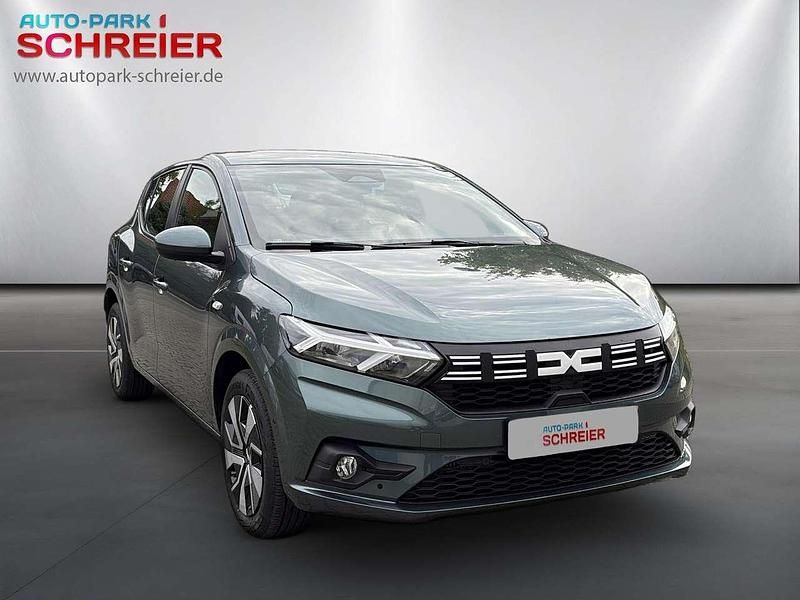 Neu Dacia Sandero Expression 91 PS (66 kW) 2025 Oxidgrün Kleinwagen