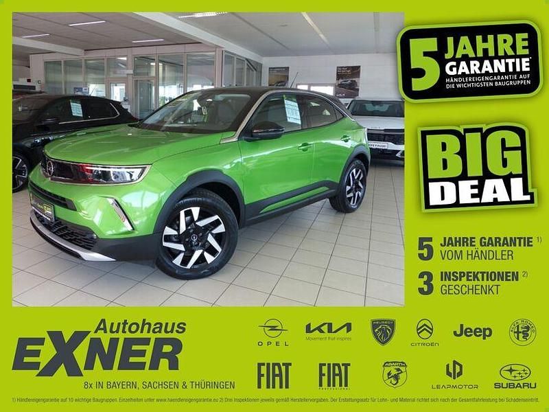 Matcha green / dach diamant schwarz Gebraucht 2022 Opel Mokka-e Elegance SUV | 15.850 € (Guter Preis) - Bild 1/4