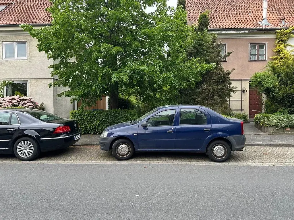 Używany Dacia Logan 75 KM (55 kW) 2009 Purpurowy Sedan/Limuzyna