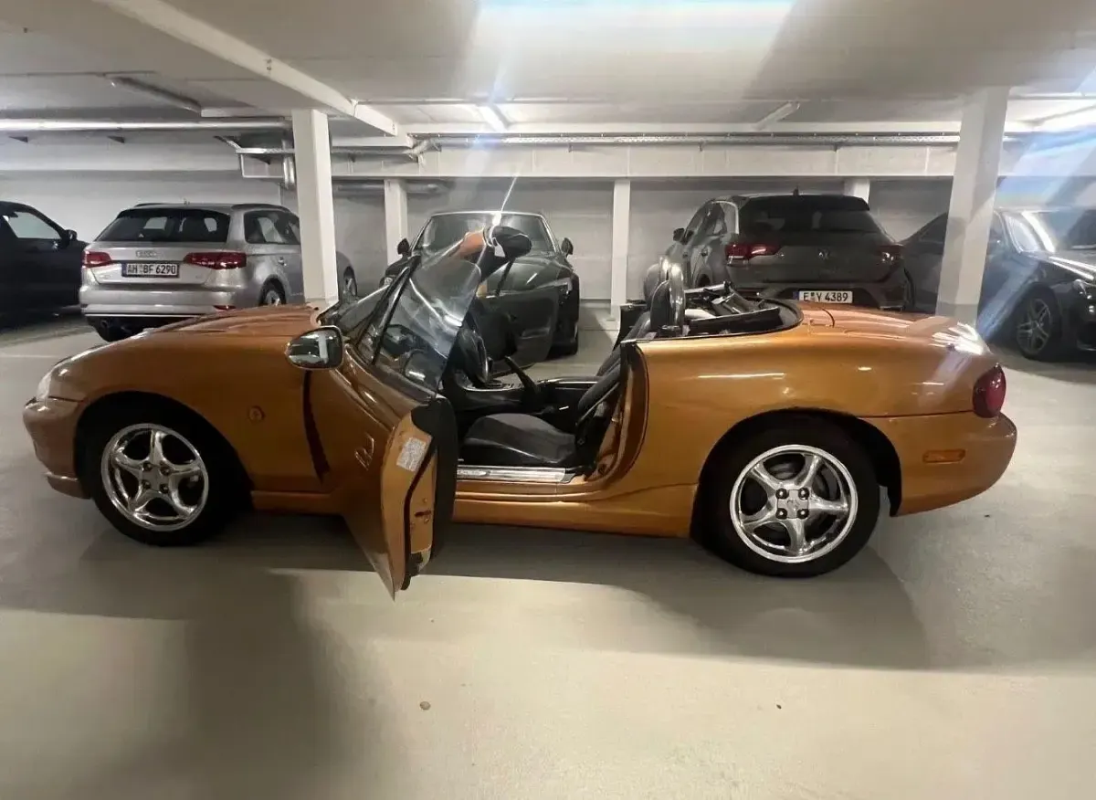 Gebraucht Mazda MX5 110 PS (80 kW) 1998 Orange Cabrio