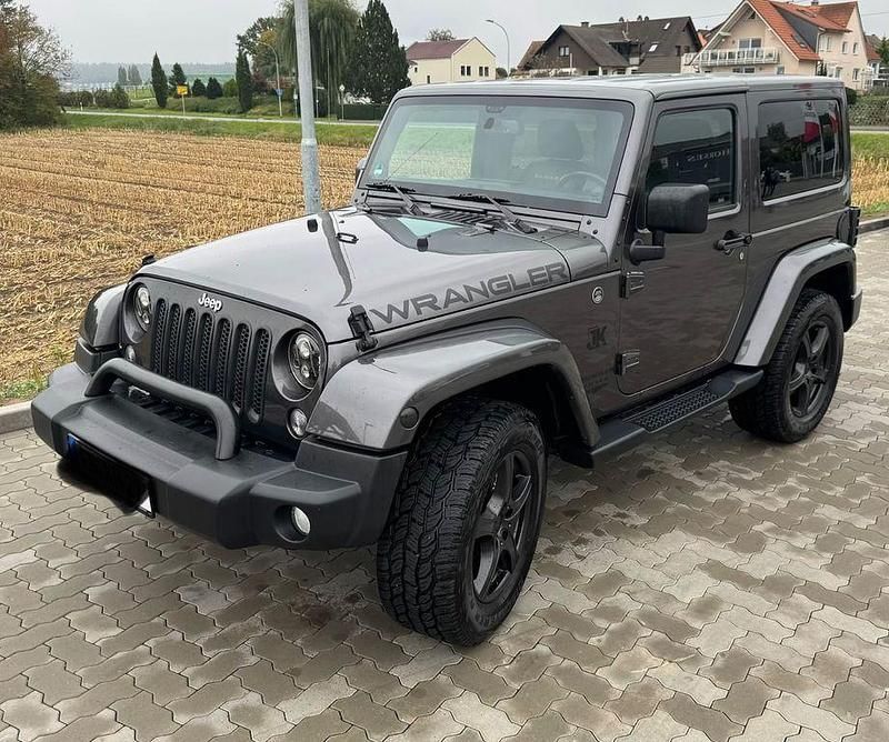 Grau Gebraucht 2014 Jeep Wrangler Sahara SUV | 30.990 € (Fairer Preis) - Bild 1/4