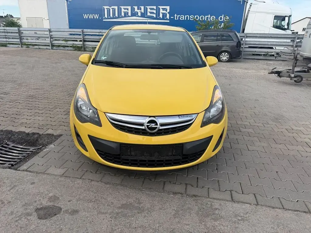 Gebraucht Opel Corsa 65 PS (47 kW) 2014 Gelb Kleinwagen
