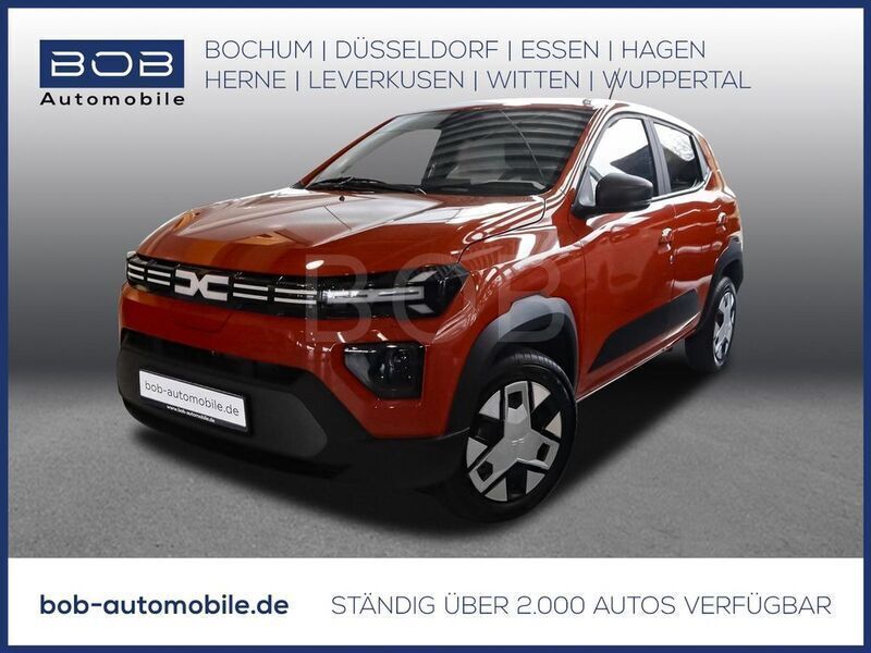 Brick red (rot) Neu 2024 Dacia Spring Expression Kleinwagen | 16.622 € (Fairer Preis) - Bild 1/2