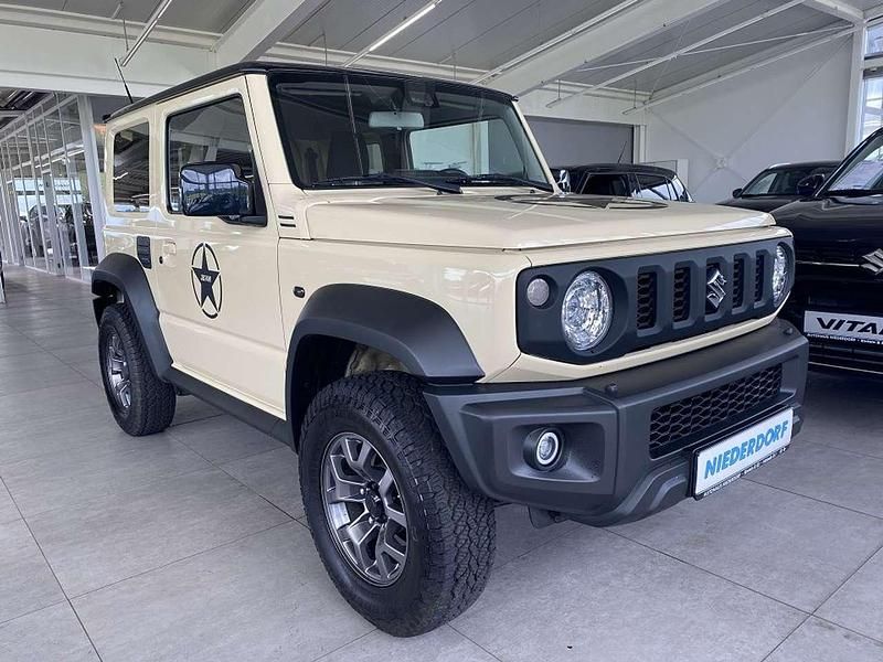 Chiffon ivory/bluish black pea (metallic) Gebraucht 2019 Suzuki Jimny Comfort SUV | 29.990 € (Fairer Preis) - Bild 1/4