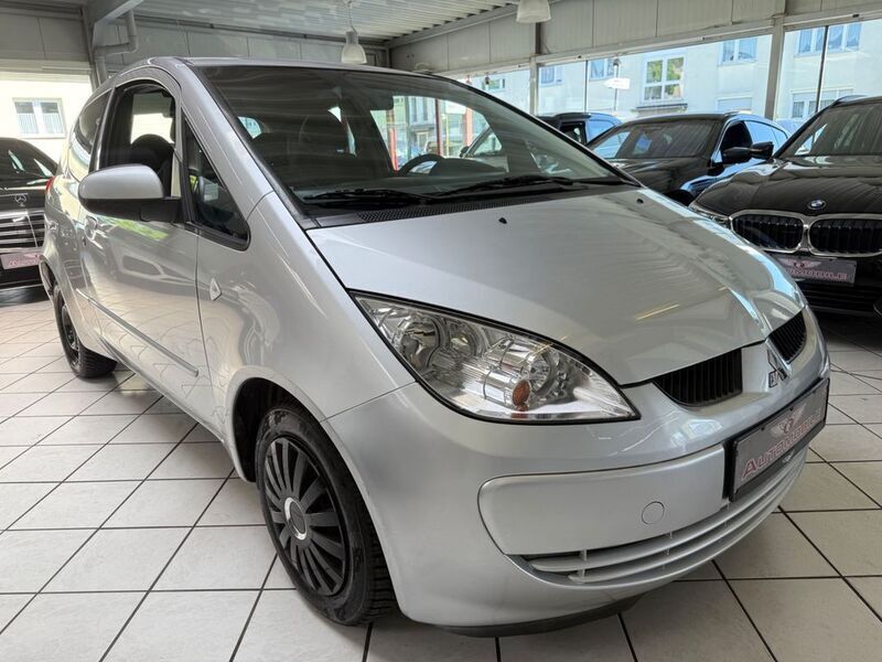 Haagsilber (m) Gebraucht 2006 Mitsubishi Colt Invite Kleinwagen | 3.400 € (Fairer Preis) - Bild 1/4