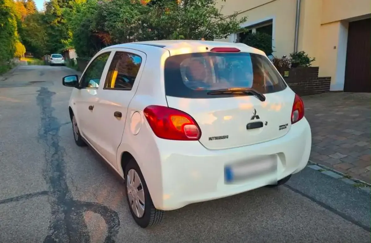 Gebraucht Mitsubishi Space Star 71 PS (52 kW) 2015 Weiß Kleinwagen