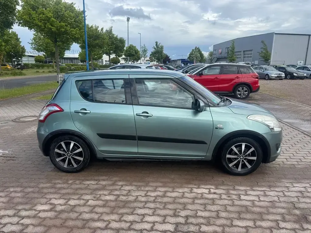 Gebraucht Suzuki Swift 94 PS (69 kW) 2012 Grün Kleinwagen