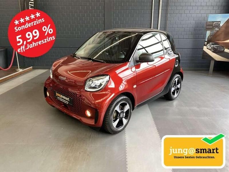 Carmine red Gebraucht 2024 Smart ForTwo Electric Drive Passion Exclusive Kleinwagen | 15.980 € (Fairer Preis) - Bild 1/4