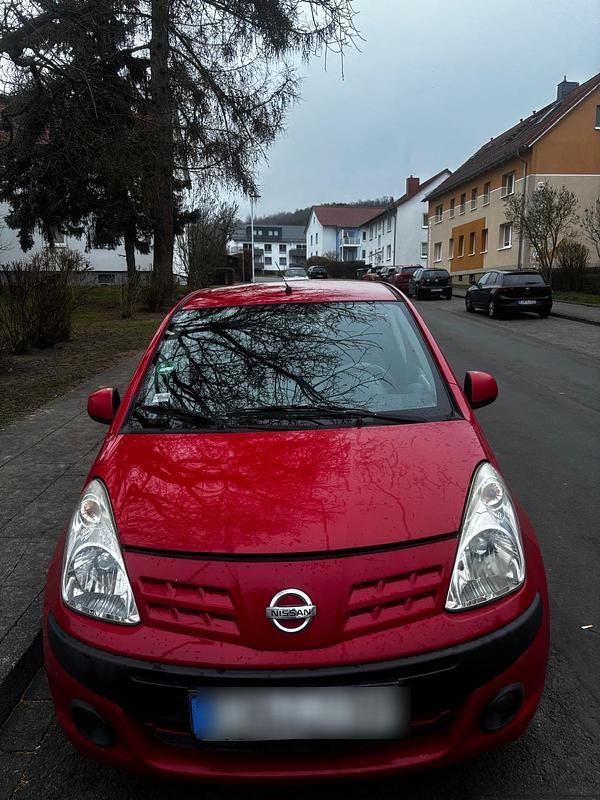 Rot Gebraucht 2010 Nissan Pixo Kleinwagen | 1.200 € - Bild 1/4