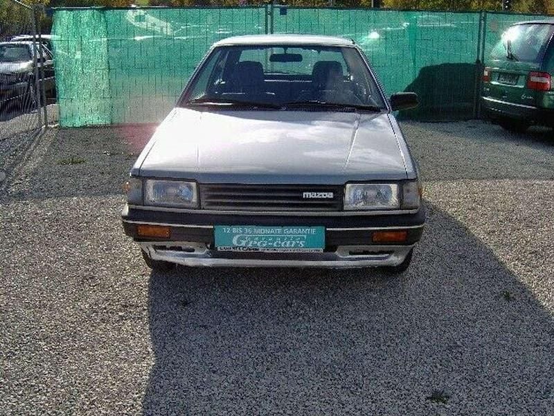 Silber Gebraucht 1987 Mazda 323 Kleinwagen | 3.290 € - Bild 1/4