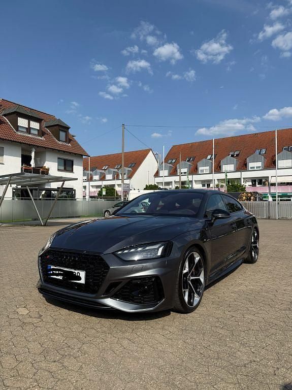 Grau Gebraucht 2023 Audi RS5 Sportback Competition Limousine | 79.700 € (Teuer) - Bild 1/4